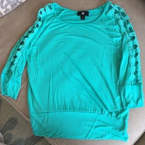 light green top with pretty cut outs on sleeves